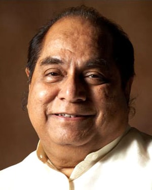 a close-up of a man smiling, dr d y patil 